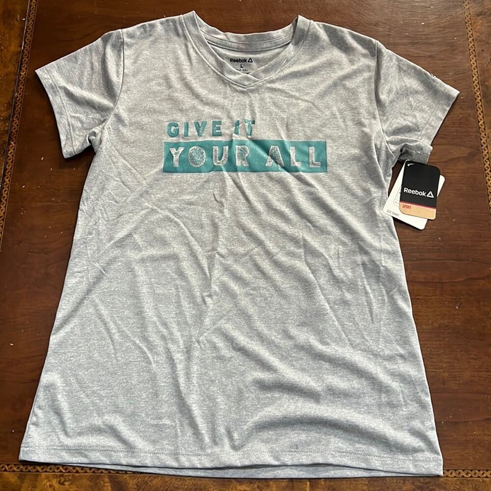 Reebok Girl’s Graphic Give it your all V Neck Gray Tshirt L 12-14